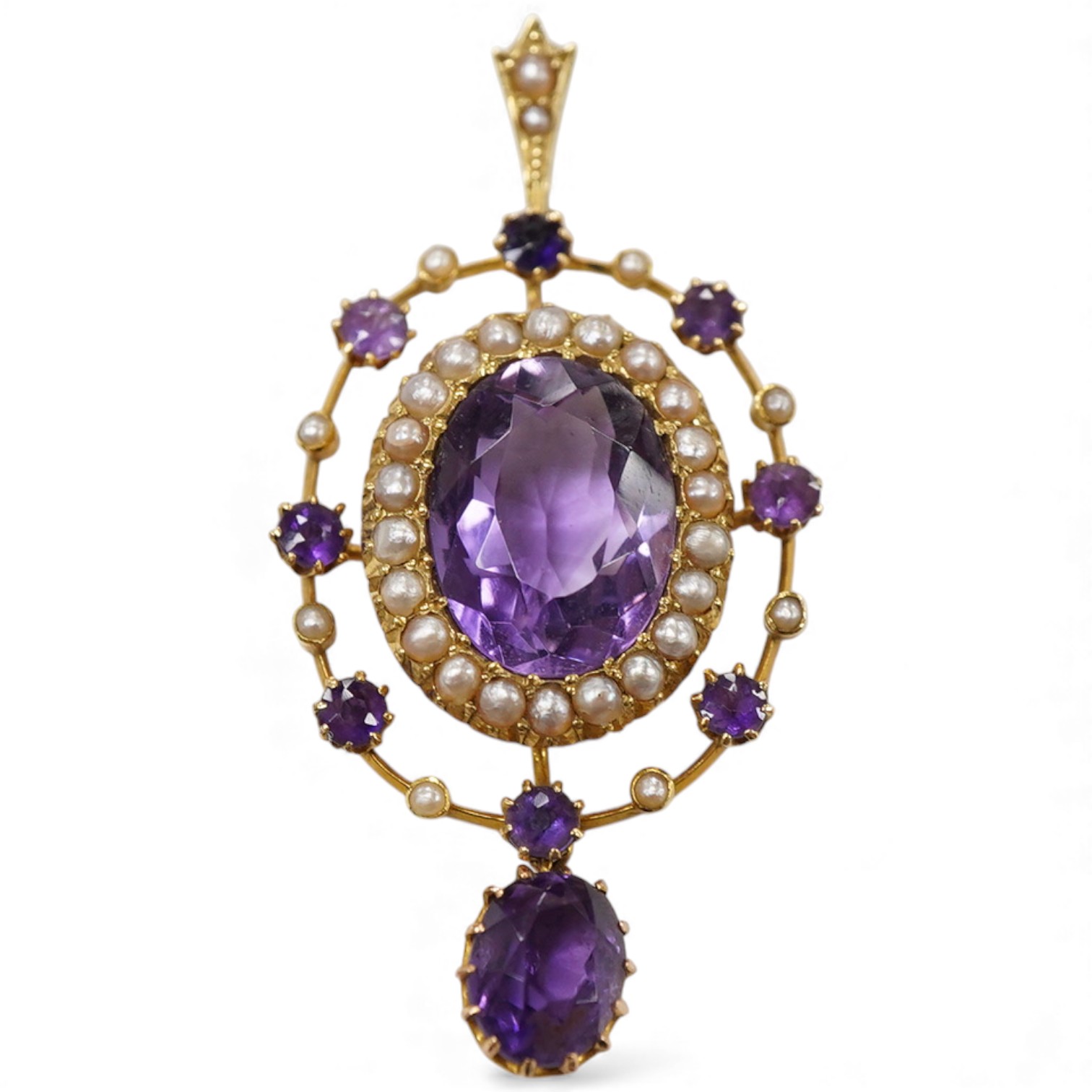An Edwardian amethyst and seed pearl pendant, early 20th century, set with an oval amethyst, within a border of split seed pearls, to an outer frame set with circular-cut amethysts and seed pearls, suspending an oval ame